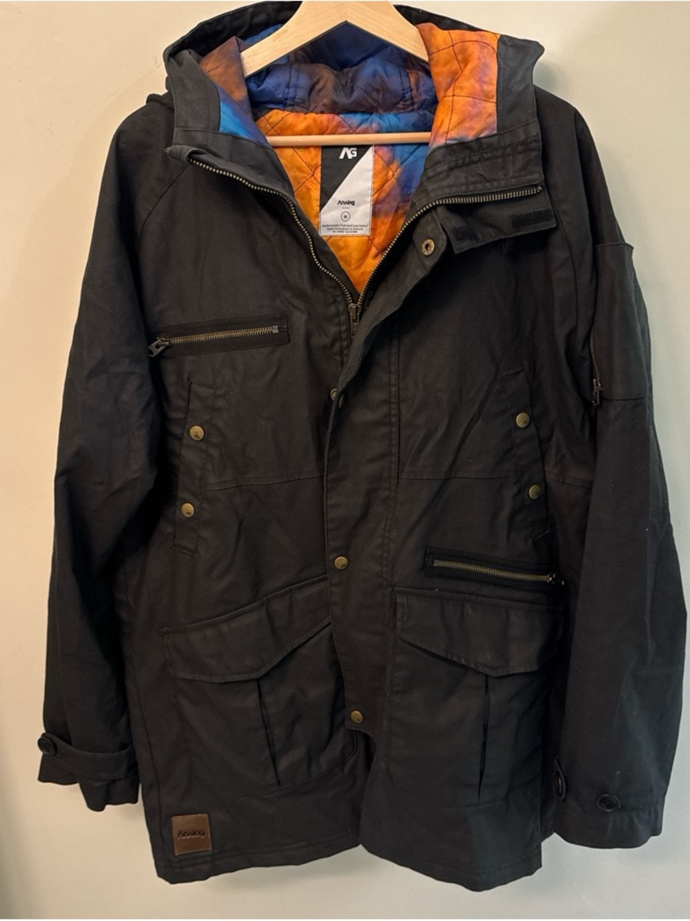 Analog Black Ski Jacket with Orange-Blue Quilted Lining